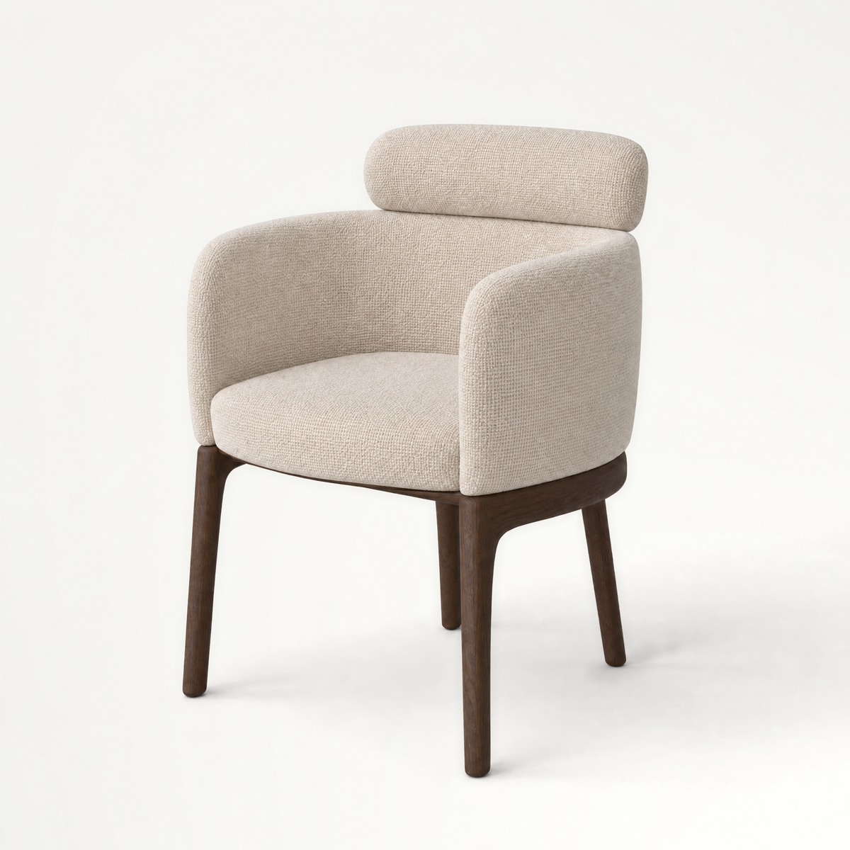 The Sia Dining Chair by Ramón Esteve features an enveloping upholstered shell, floating lumbar cushion, and tapered Dark Oak legs, available at ACERKA Miami.