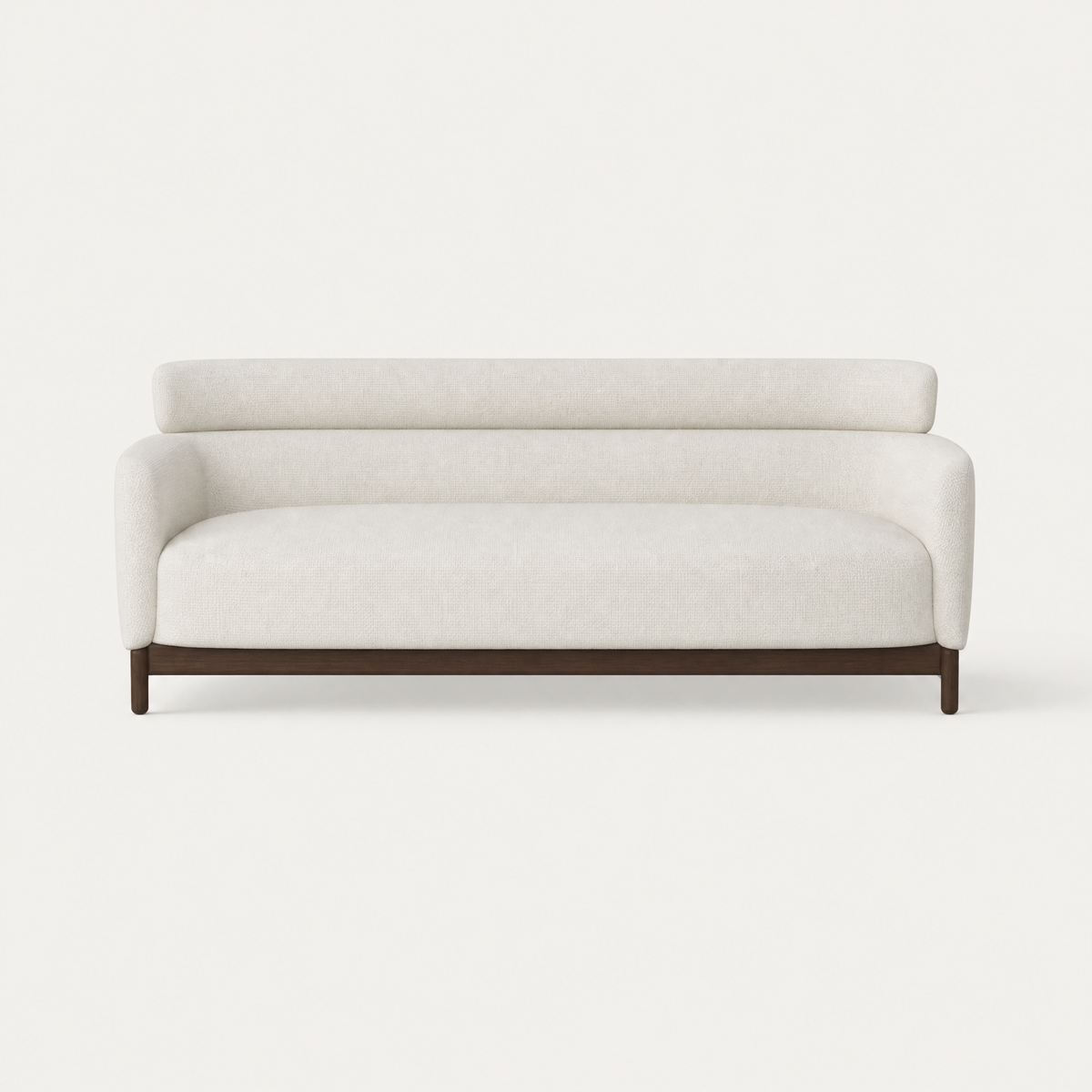 ACERKA Miami presents the Sia Medium Sofa by Ramón Esteve, featuring Alpine White upholstery, softly rounded arms, and a curved Dark Oak base.