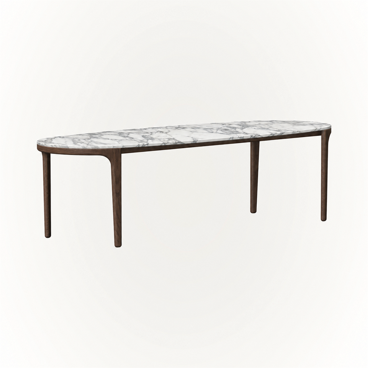 With its softly rounded stone surface and slender oak legs, the Tcha Dining Table at ACERKA Miami balances substantial materials with a visually light profile.
