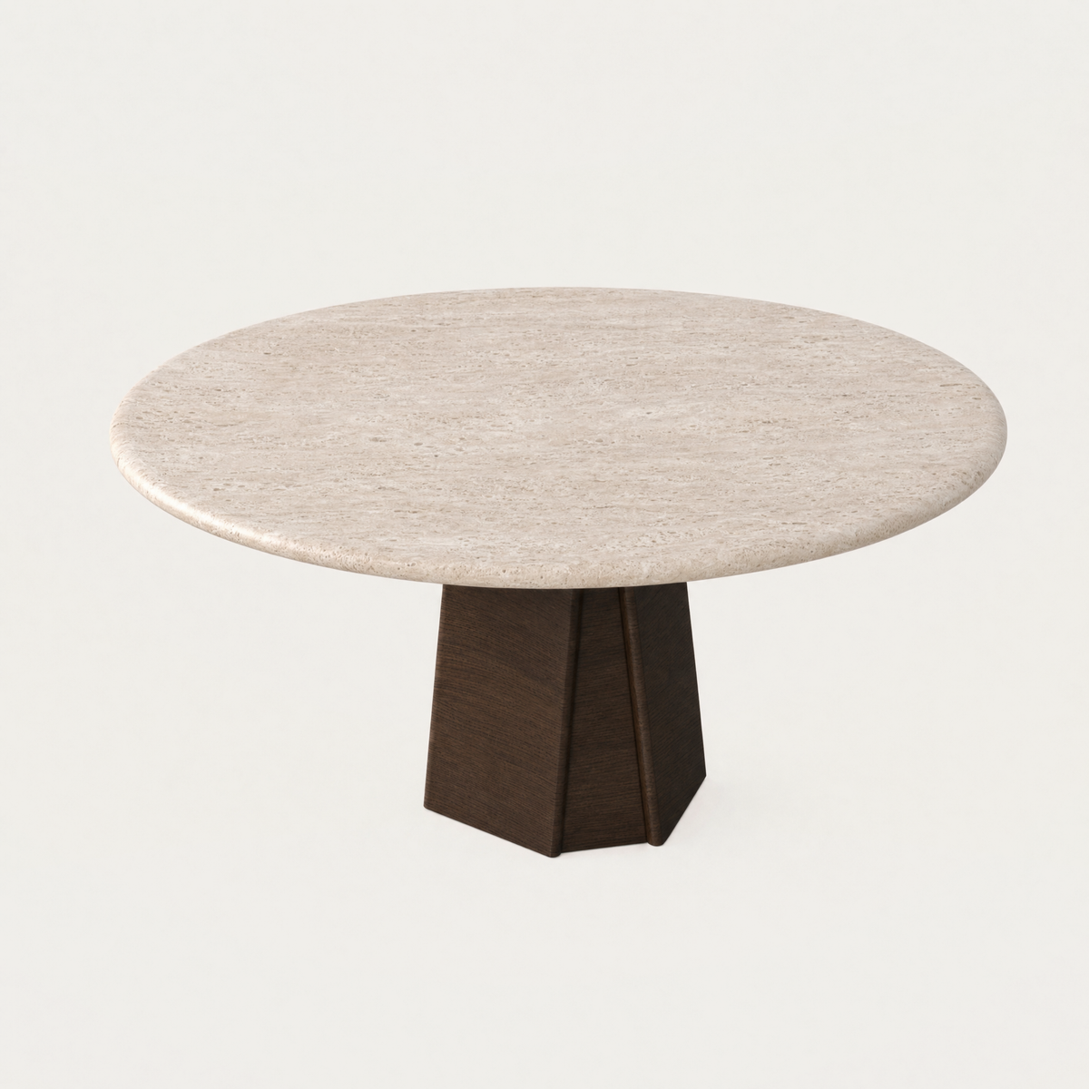 The Chuli Round Dining Table by Valerio Sommella showcases the organic movement and tonal variations of Italian Light Travertine, available at ACERKA Miami.