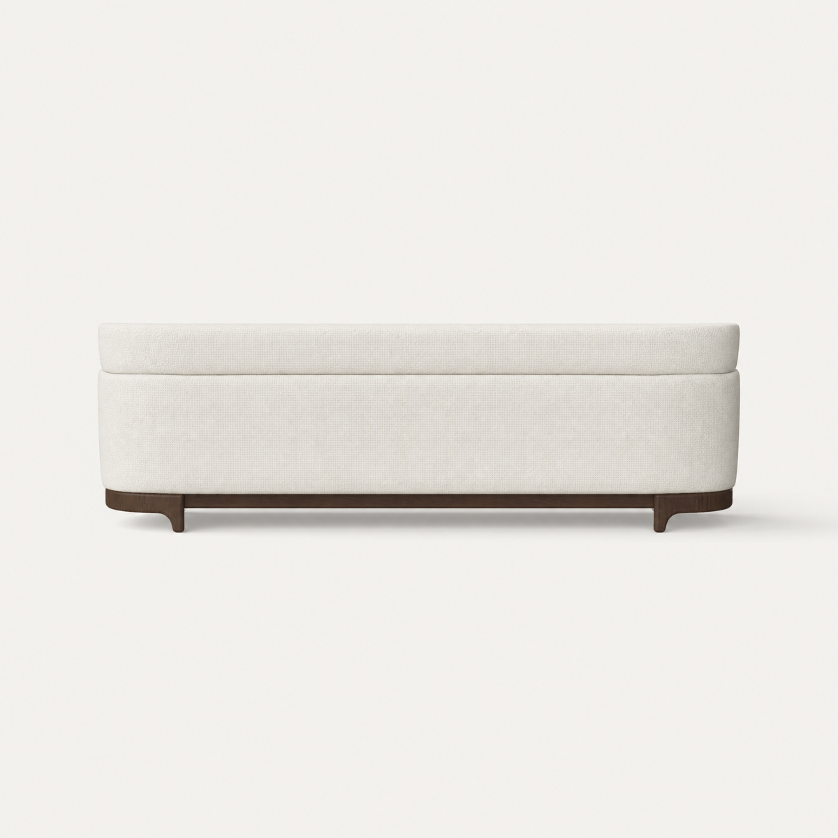 Alpine White upholstery shapes the generous proportions of Ramón Esteve’s Sia Large Sofa, complemented by a Dark Oak base and showcased at ACERKA Miami.