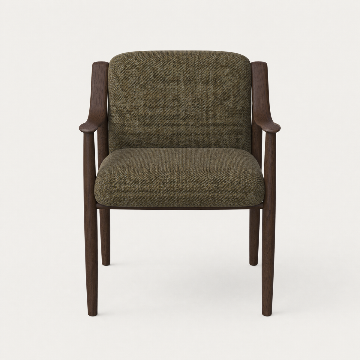 The Tibeto Dining Chair by Ramón Esteve features sweeping carved oak armrests and a softly rounded Olive Green upholstered interior, available at ACERKA Miami.
