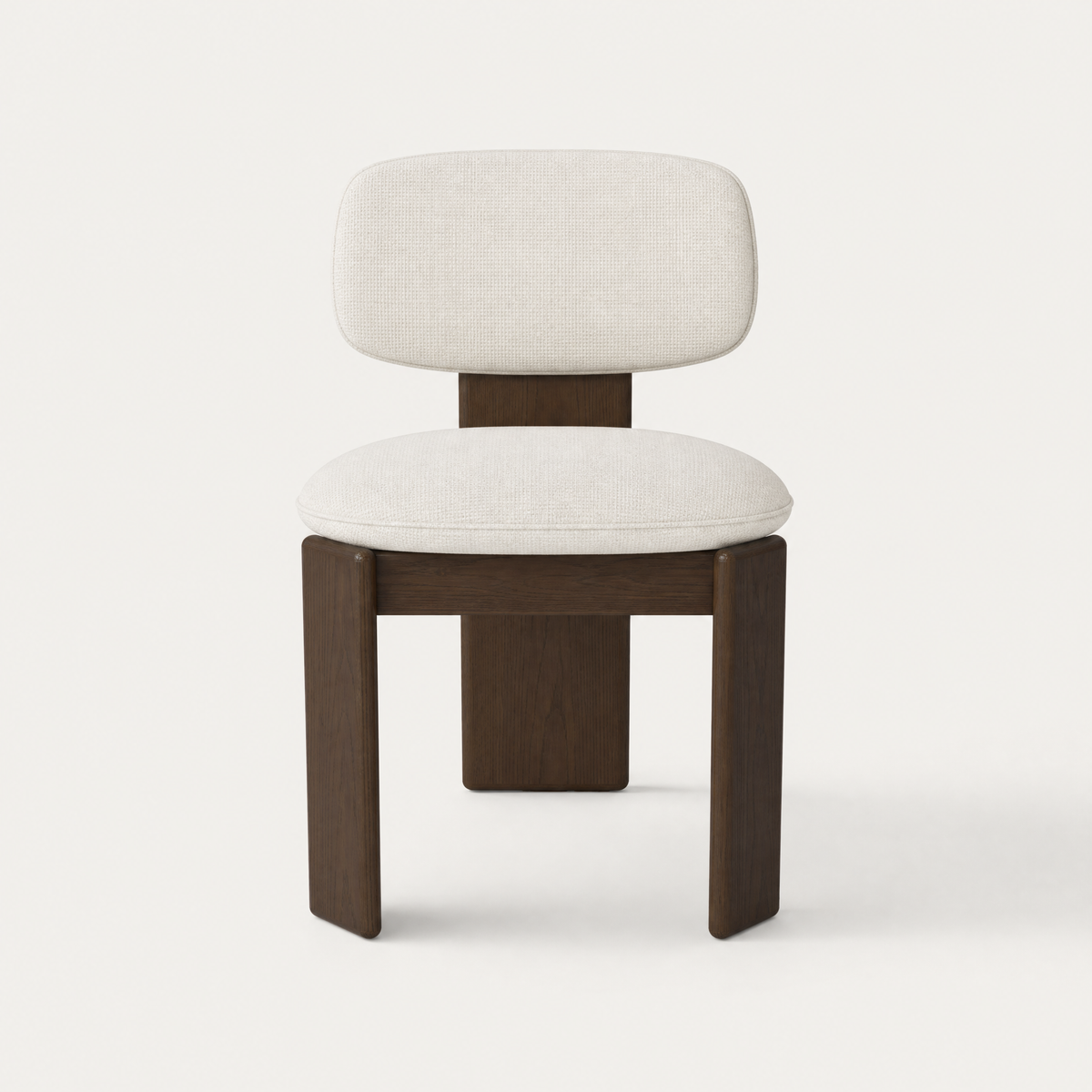 The Gaba Dining Chair by Valerio Sommella pairs generous upholstery with FSC-certified Dark Oak, creating a sculptural dining silhouette available at ACERKA Miami.