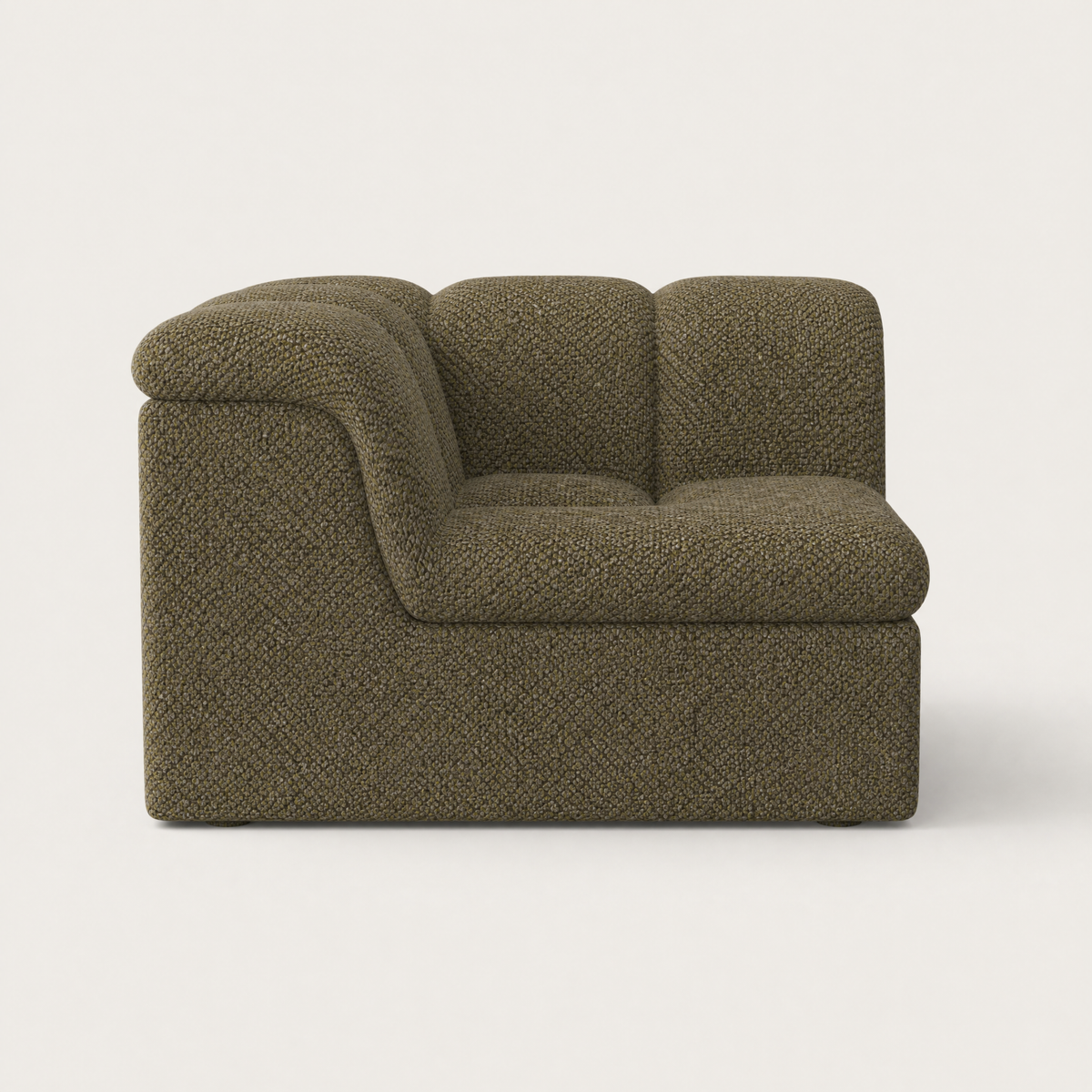 A modern low-profile accent chair upholstered in a textured fabric in olive green, shown from a front three-quarter angle against a light off-white background. Designed by Valerio Sommella for Acerka