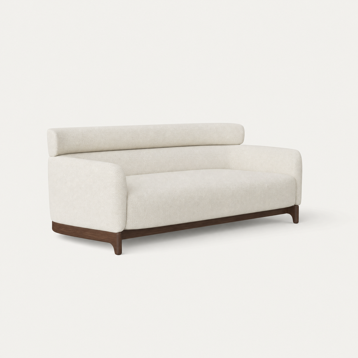 The Sia Medium Sofa by Ramón Esteve pairs an enveloping Alpine White silhouette with slender integrated Dark Oak legs, available at ACERKA Miami.