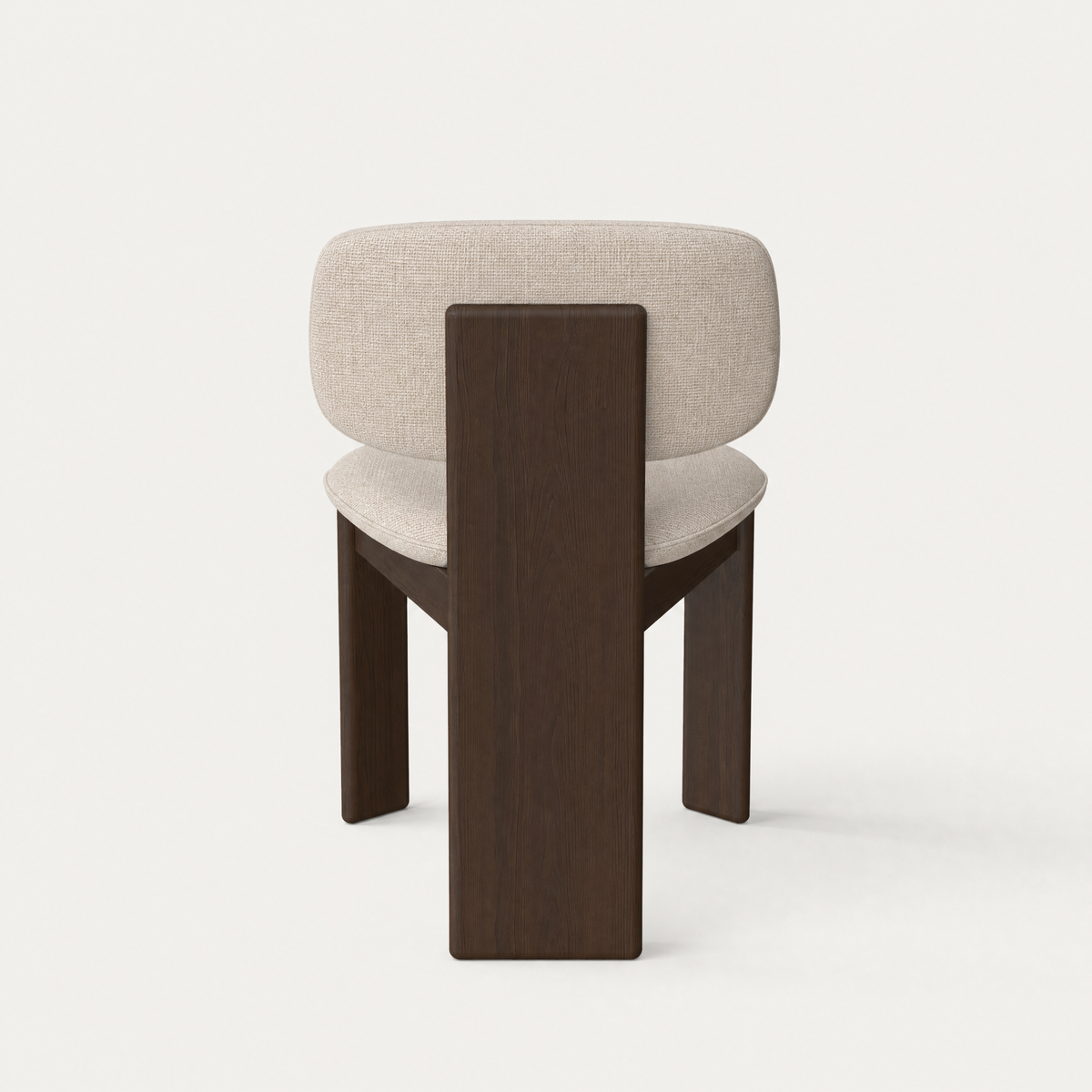 Valerio Sommella pairs a generously upholstered seat with a clean architectural oak frame in the Gaba Dining Chair, presented by ACERKA Miami.