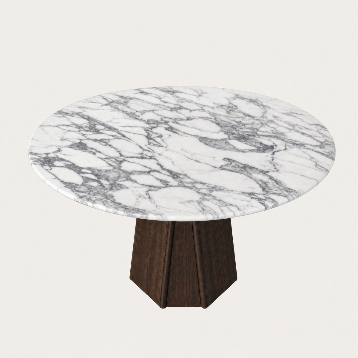 Designed by Valerio Sommella, the Chuli Round Dining Table brings Italian Arabescato Marble and sculptural architectural form to the ACERKA Miami collection.