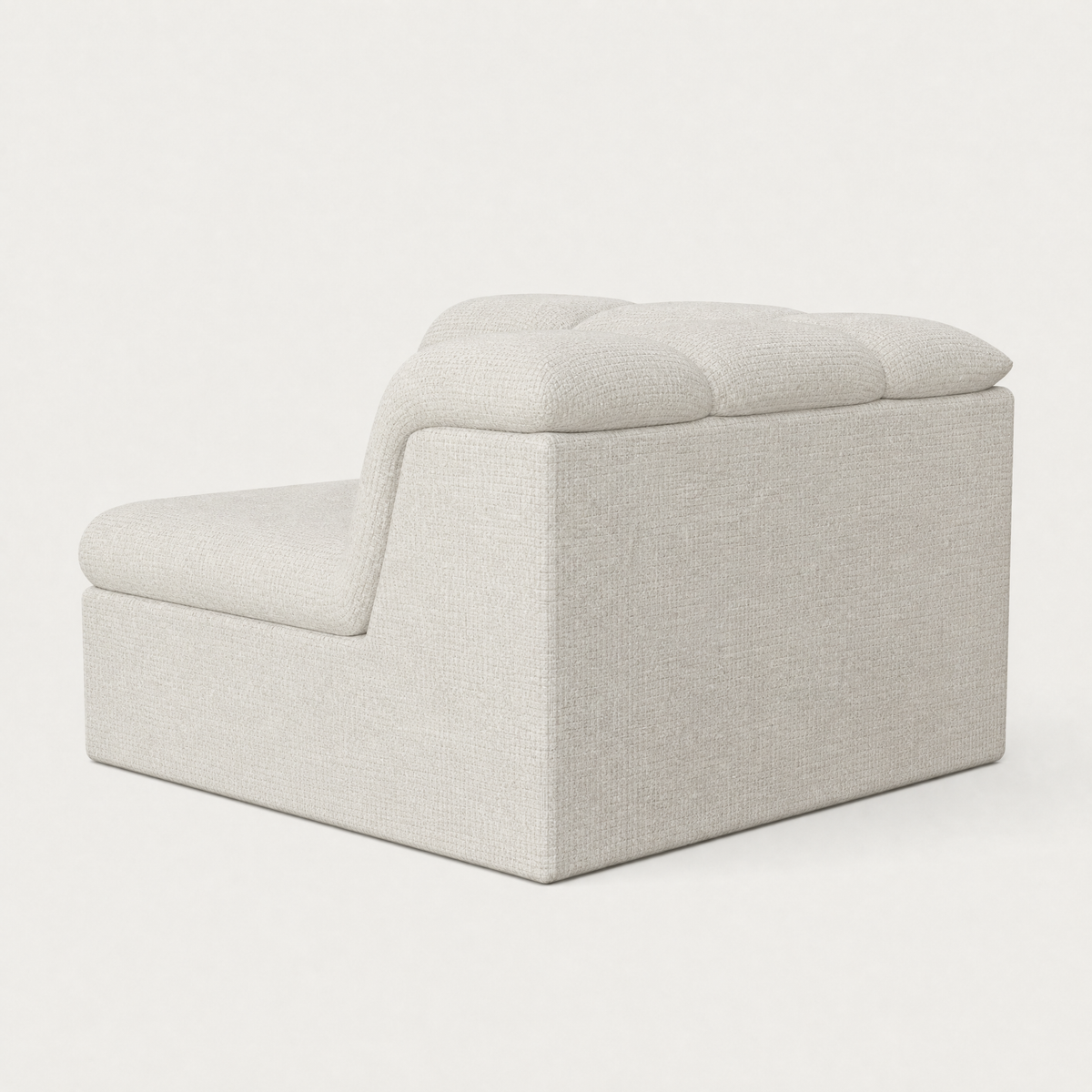 A modern L-shaped modular sofa corner piece upholstered in a light beige textured fabric, shown from a three-quarters angle against a clean white background. Designed by Valerio Somella for Acerka.