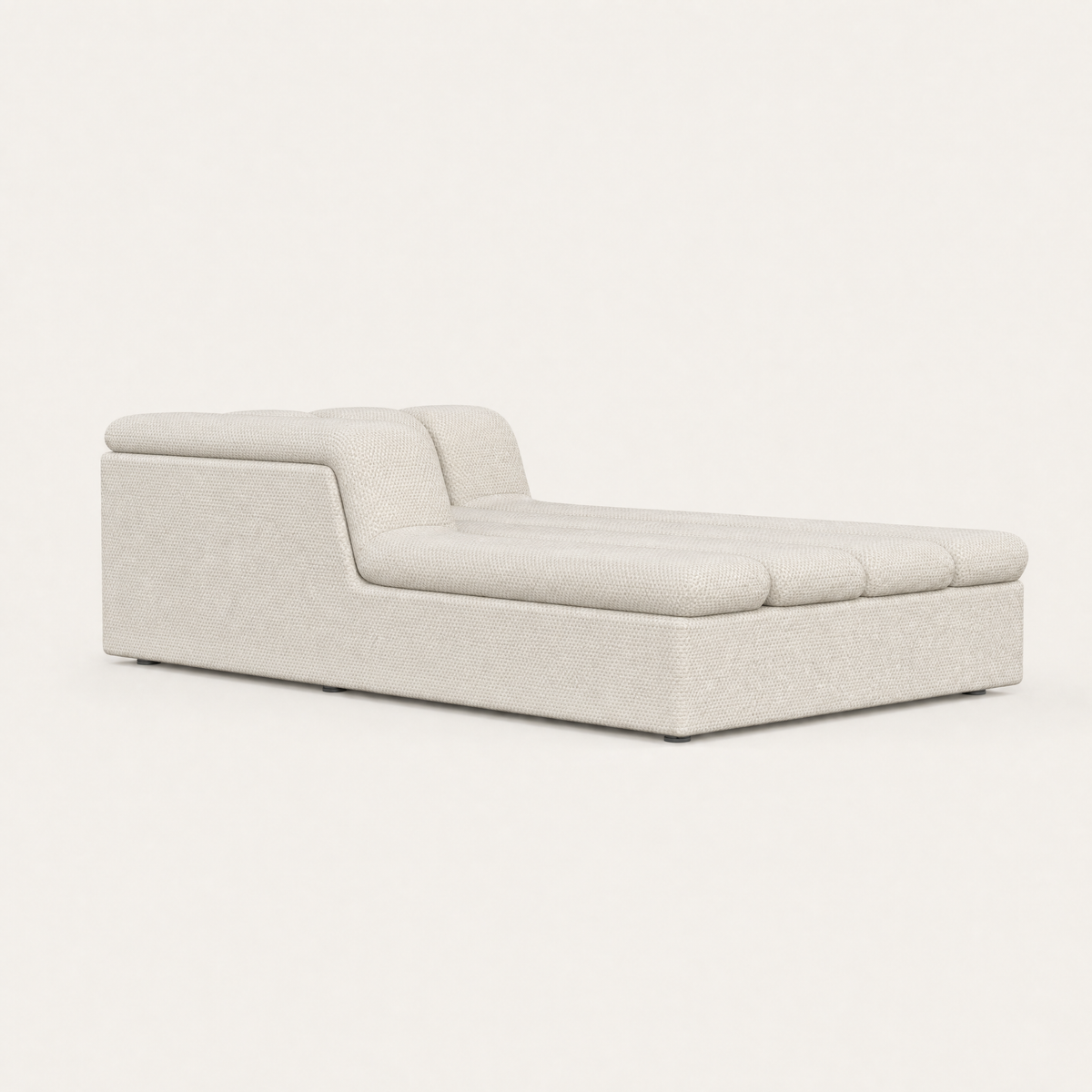 Designed by Valerio Sommella, the Devi Chaise Module combines an elongated form with sculpted cushioning and softly rounded contours.