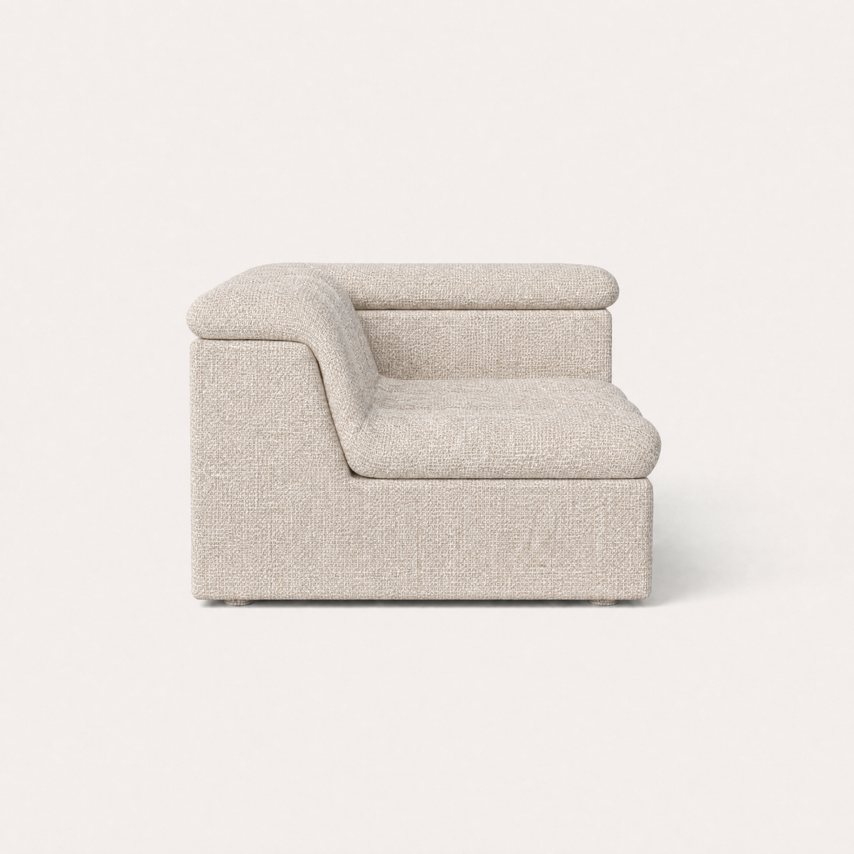 Designed by Valerio Sommella, the Devi Left Arm Sofa Module combines architectural softness with generous cushioned seating.