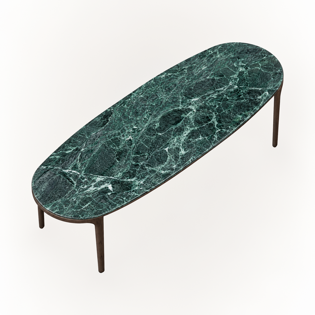The Tcha Dining Table combines an elongated rounded Verde Alpi marble top with streamlined Dark Oak legs, bringing architectural character to the ACERKA Miami collection.