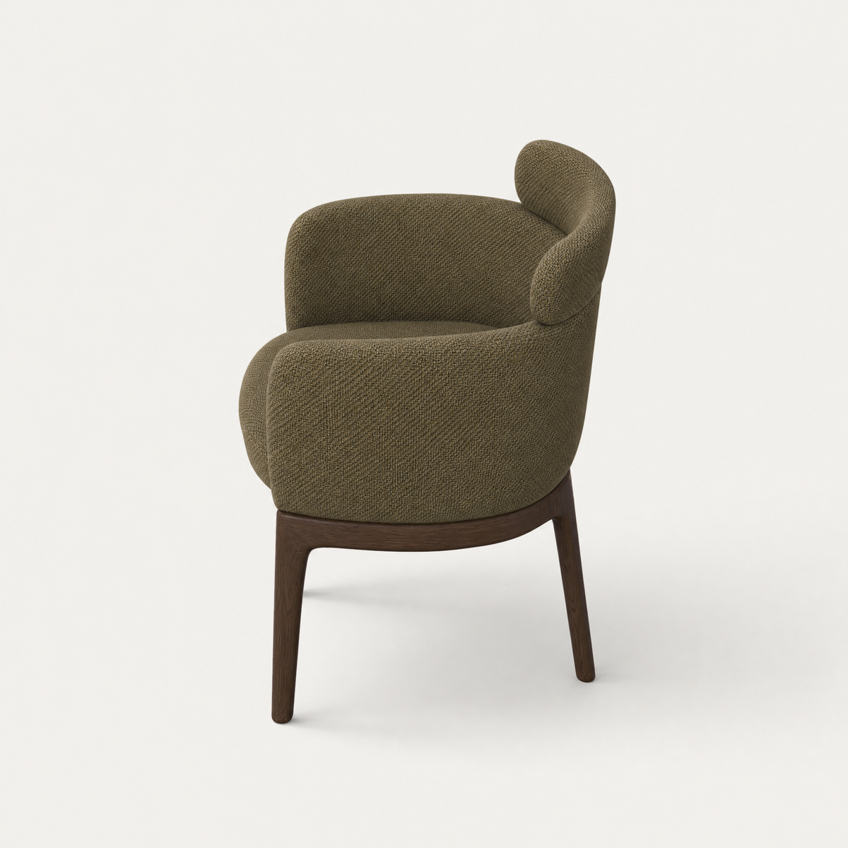 The Sia Dining Chair by Ramón Esteve brings enveloping curves and FSC-certified Dark Oak craftsmanship to the ACERKA Miami collection.