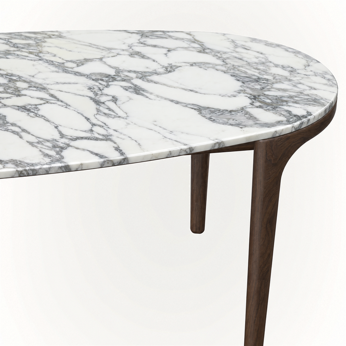 Italian Arabescato marble contrasts with slender Dark Oak proportions in ACERKA Miami’s Tcha Dining Table, creating a substantial yet visually light silhouette.