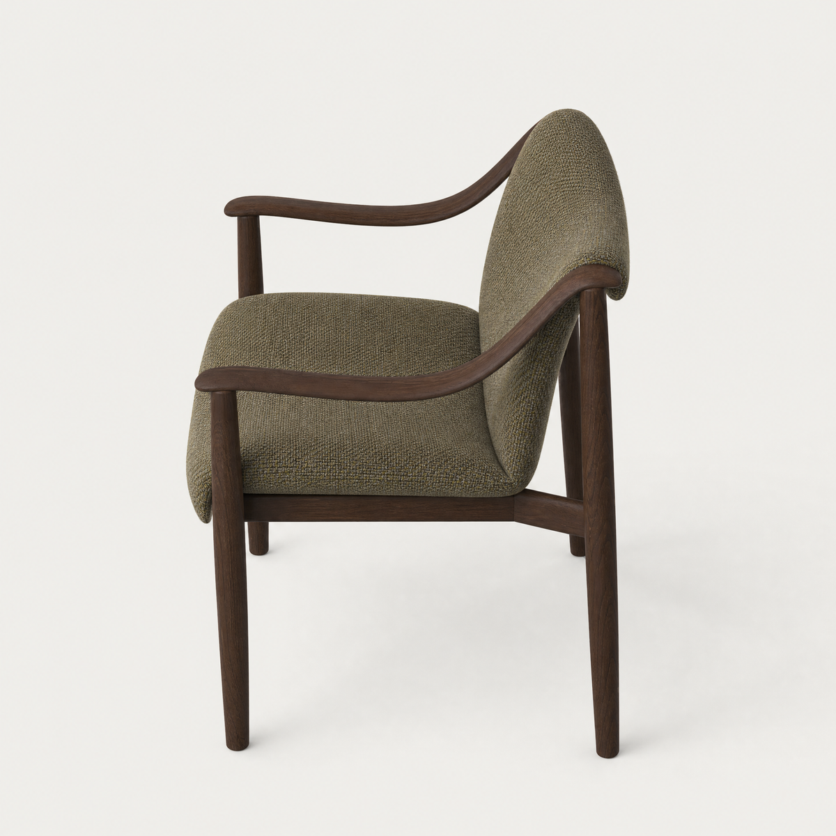 Designed by Ramón Esteve, the Tibeto Dining Chair at ACERKA Miami contrasts an expressive Dark Oak structure with substantial Olive Green upholstery.