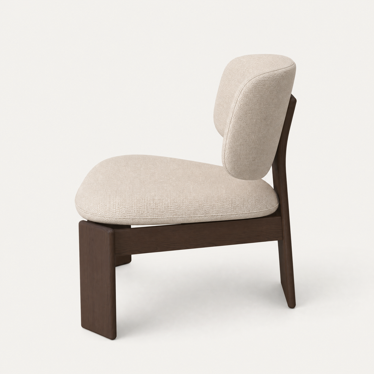 Designed by Valerio Sommella, the Gaba Lounge Chair at ACERKA Miami features a deeply padded seat, soft curved backrest, and rounded solid oak detailing.