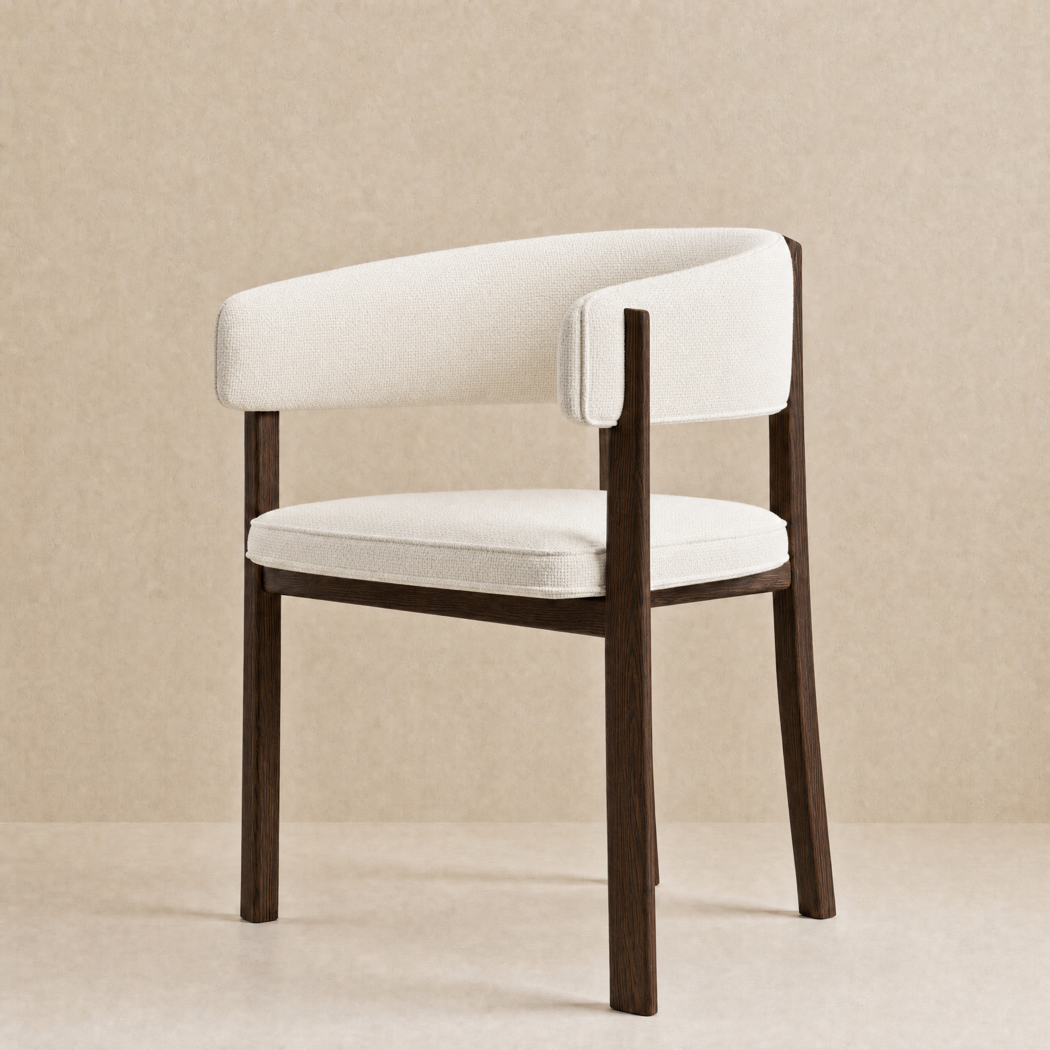 A modern accent chair with a curved white upholstered backrest and seat cushion, supported by a dark brown wooden frame, set against a neutral beige textured background.