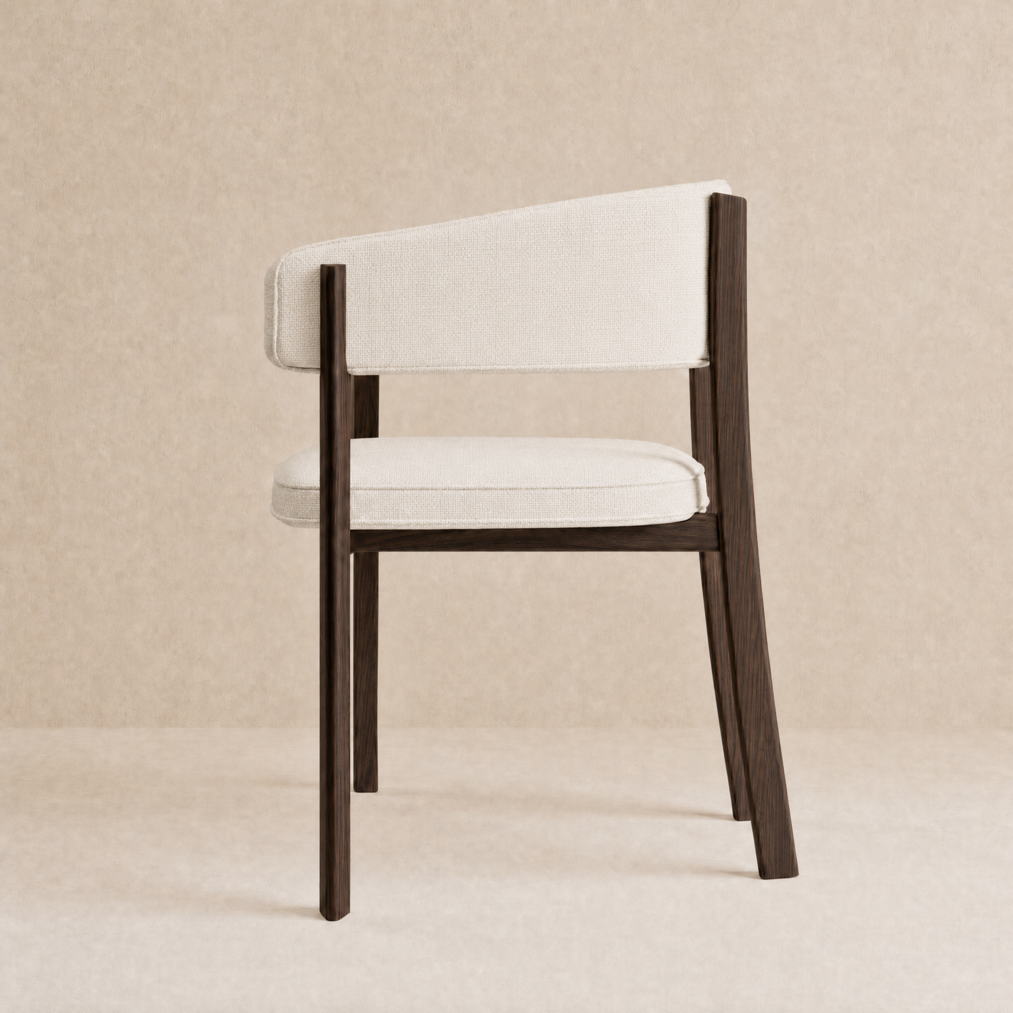 A modern accent chair with a dark brown wooden frame and off-white upholstered seat and backrest, shown against a neutral beige textured background.