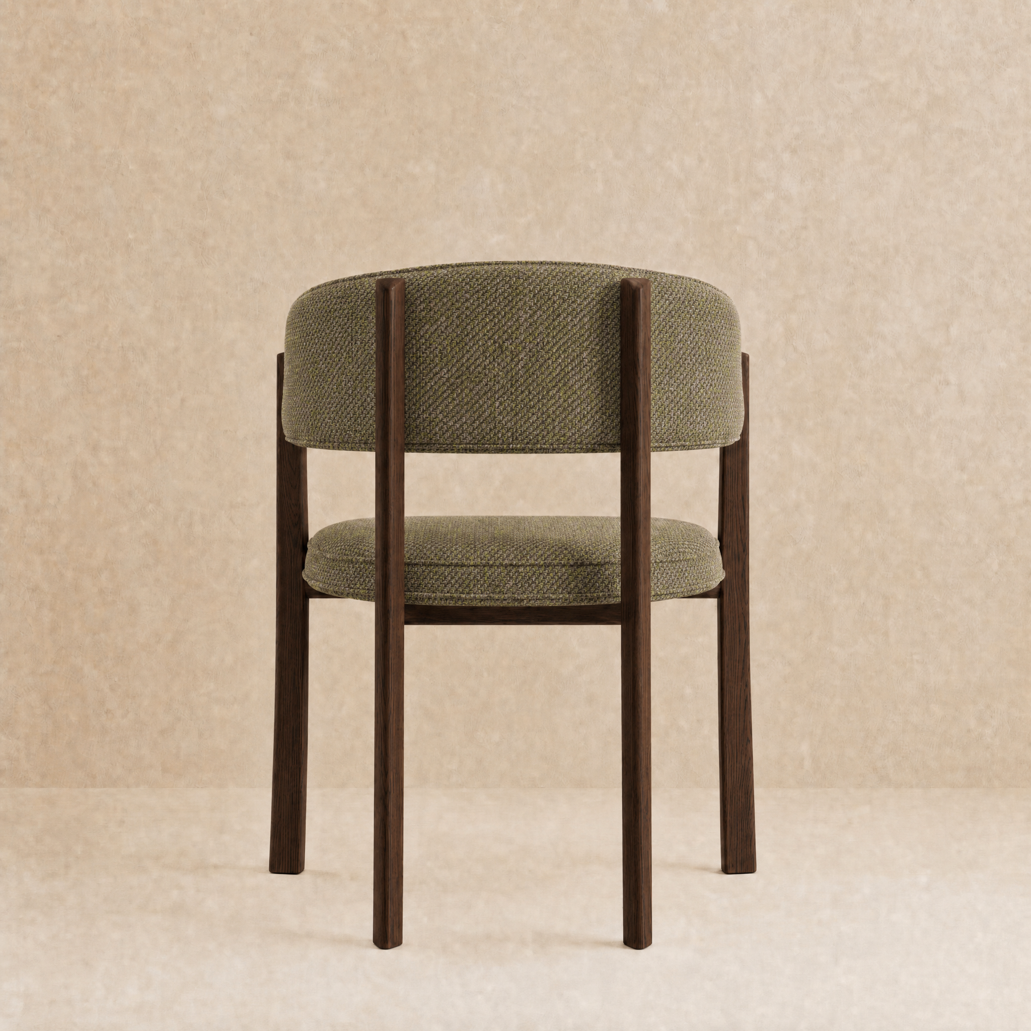 A modern dining chair with a textured sage green upholstered seat and backrest, supported by a dark brown wooden frame, set against a neutral beige textured background.