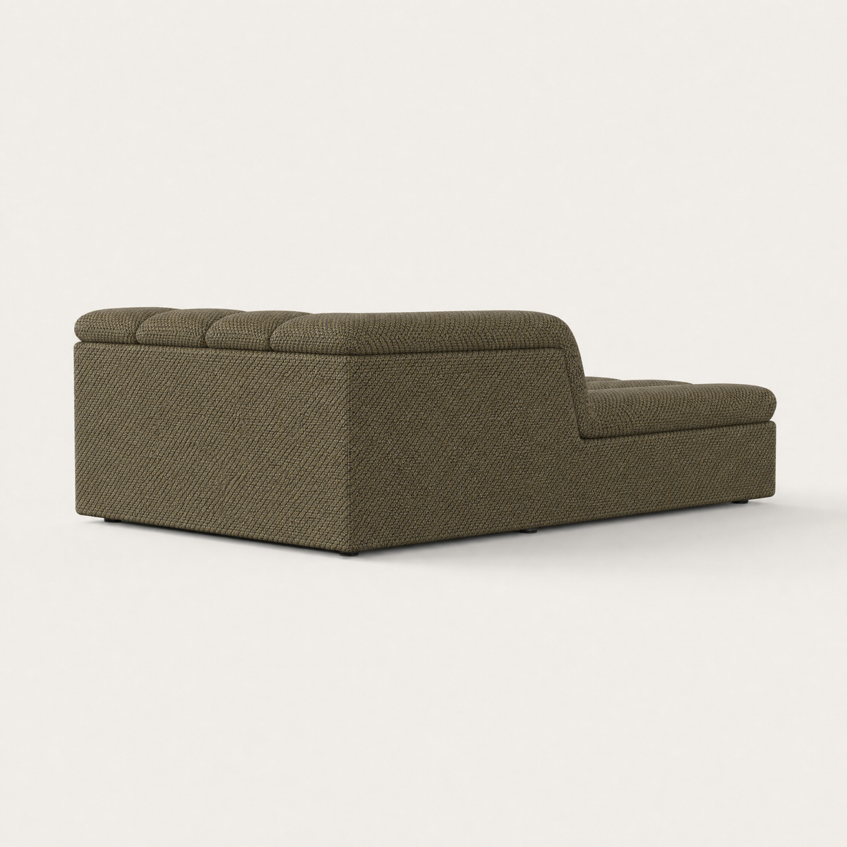 Designed by Valerio Sommella, the Devi Chaise Module combines an elongated form with sculpted cushioning and softly rounded contours.
