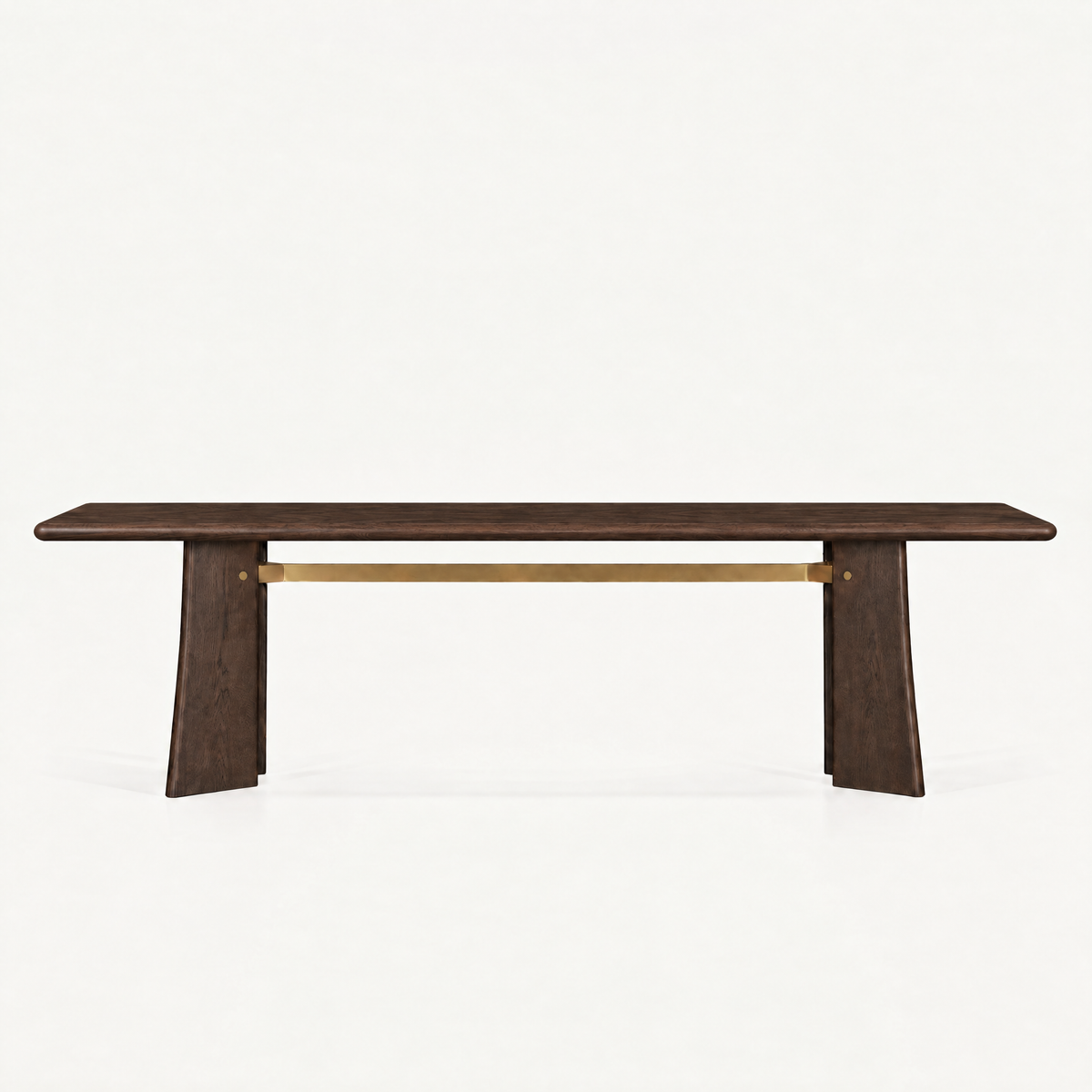 The Balado Rectangular Dining Table by Francesco Meda features a clean tabletop, sculptural trestle base, and signature brass detail, available at ACERKA Miami.