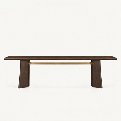 The Balado Rectangular Dining Table by Francesco Meda features a clean tabletop, sculptural trestle base, and signature brass detail, available at ACERKA Miami.