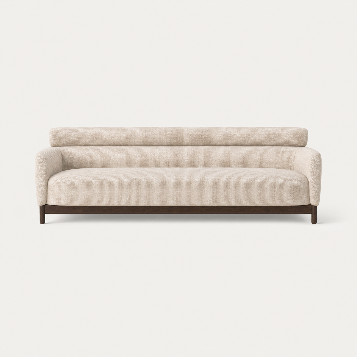 The Sia Large Sofa by Ramón Esteve features Stone Beige upholstery, gently rounded arms, and a sculptural Dark Oak base, available at ACERKA Miami.