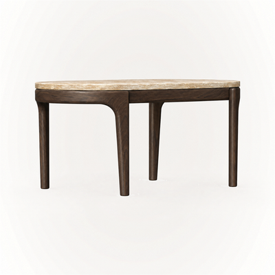 Designed by Ramón Esteve, the Tcha High Coffee Table at ACERKA Miami showcases a raised silhouette and the unique tonal variations of Italian Light Travertine.