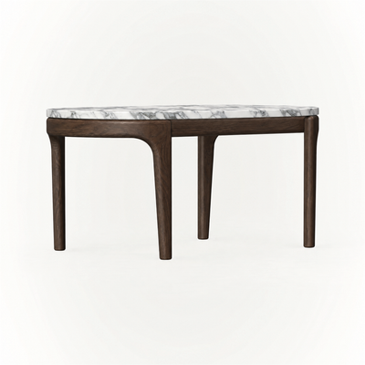Natural pores and subtle tonal variations give the Tcha High Coffee Table its distinctive character, with Ramón Esteve’s raised silhouette presented by ACERKA Miami.