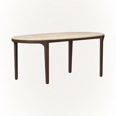 The Tcha Dining Table pairs a warm Italian Travertine top with a slender Dark Oak frame, creating a refined silhouette available at ACERKA Miami.