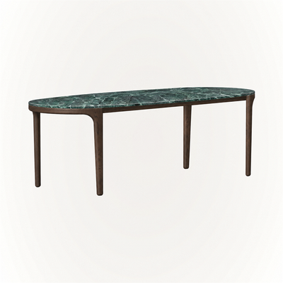 visual presence.
ACERKA Miami presents the Tcha Dining Table, featuring a richly veined Verde Alpi marble top supported by a slender Dark Oak frame and four-leg base.