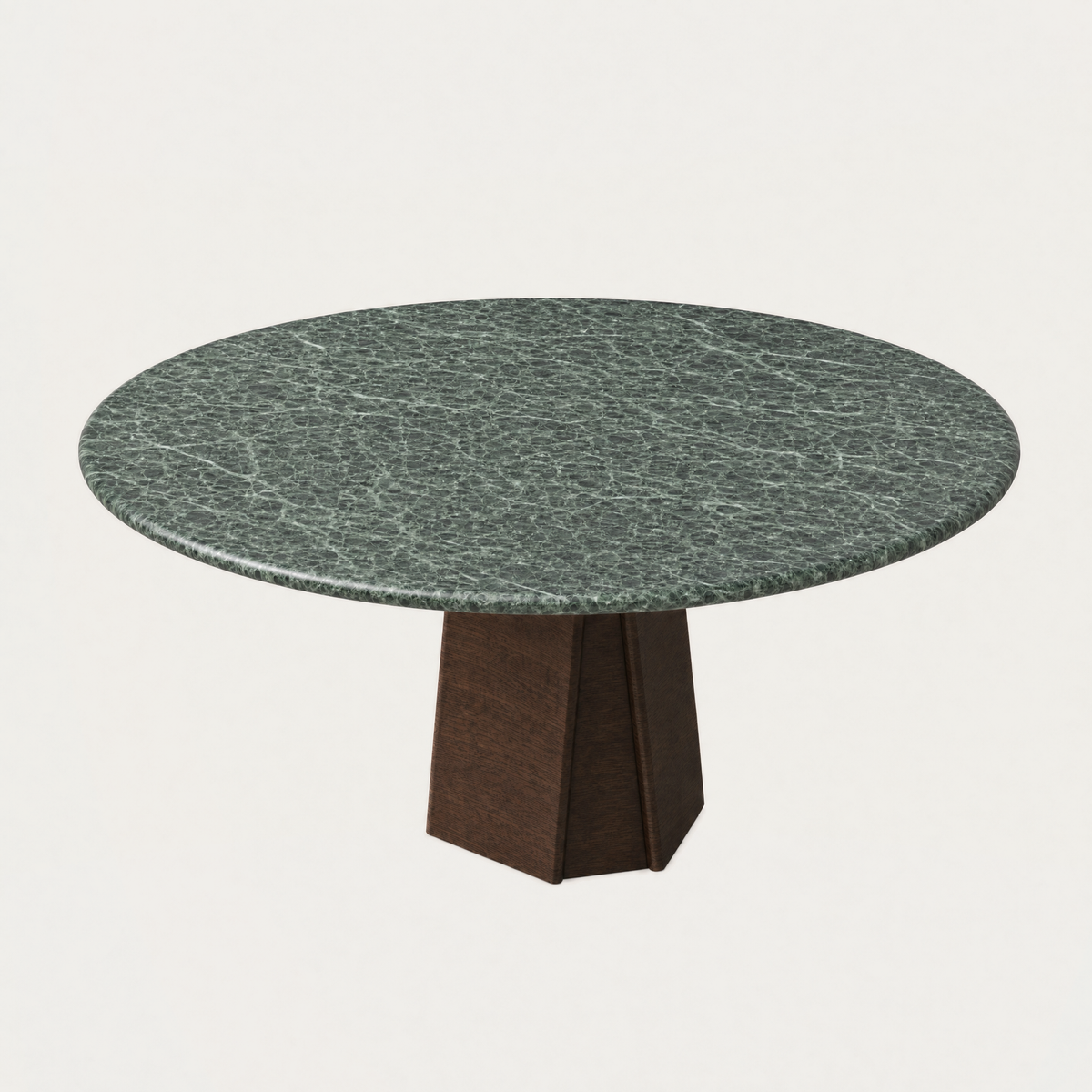 Dramatic natural veining defines the Verde Alpi marble surface of Valerio Sommella’s Chuli Round Dining Table, available at ACERKA Miami.