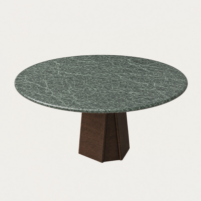 Dramatic natural veining defines the Verde Alpi marble surface of Valerio Sommella’s Chuli Round Dining Table, available at ACERKA Miami.