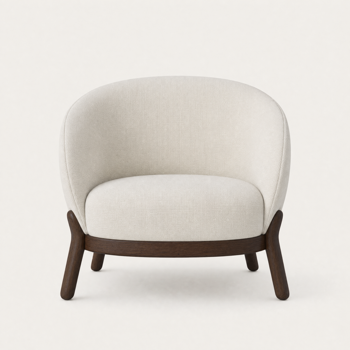 Designed by Ramón Esteve, the Lifa Accent Chair at ACERKA Miami combines a curved upholstered backrest with warm natural oak and balanced proportions.