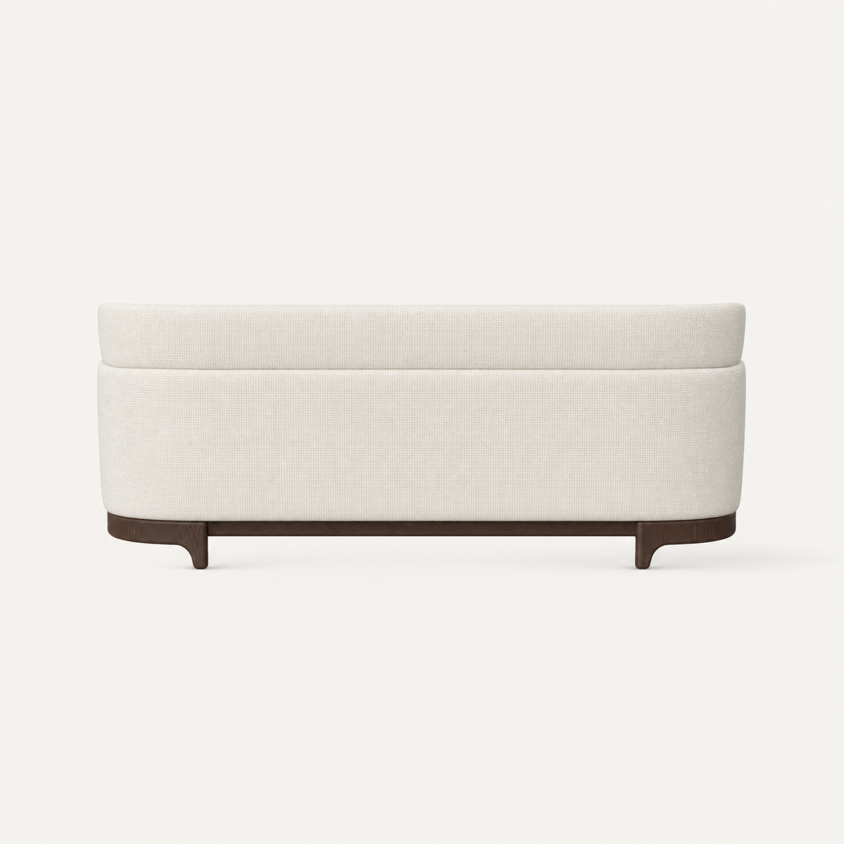 Alpine White upholstery defines the balanced proportions of Ramón Esteve’s Sia Medium Sofa, complemented by a curved Dark Oak base and showcased at ACERKA Miami.