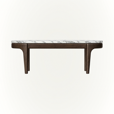 The Tcha Low Coffee Table features a generous tabletop and low architectural silhouette, creating a sculptural centerpiece available at ACERKA Miami.