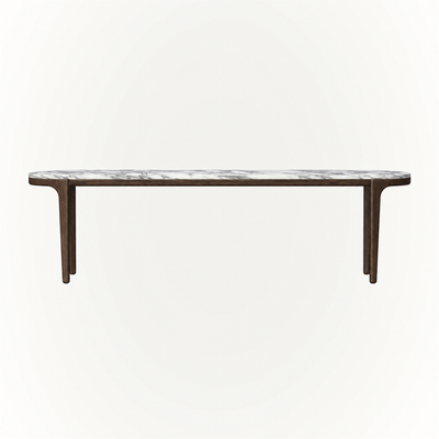 The Tcha Dining Table features an elongated Italian Arabescato marble top and slender Dark Oak frame, available at ACERKA Miami.