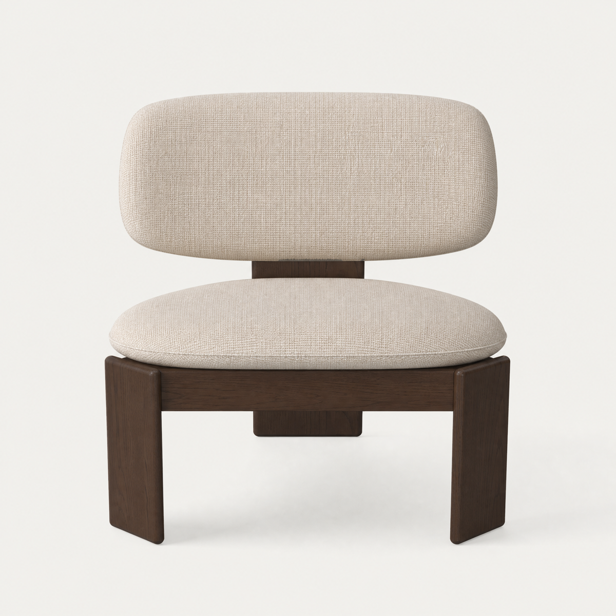 ACERKA Miami presents the Gaba Lounge Chair by Valerio Sommella, shaped with an enveloping upholstered backrest and a solid American oak frame in Dark Oak.