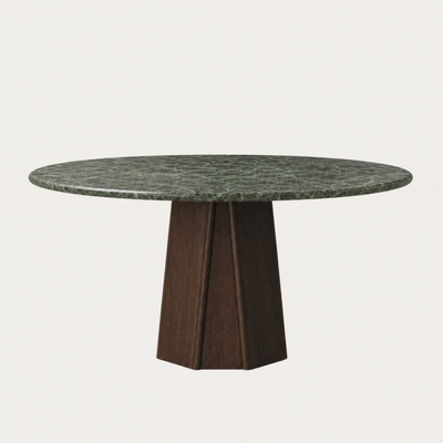 ACERKA Miami presents the Chuli Round Dining Table by Valerio Sommella, pairing deep green Verde Alpi marble with a sculptural faceted oak base.