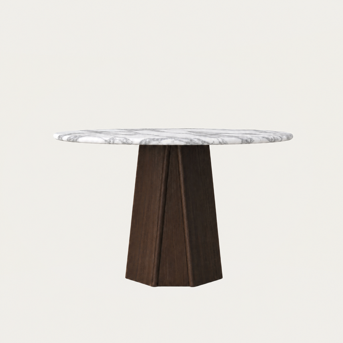 The Chuli Round Dining Table by Valerio Sommella features expressive Italian Arabescato Marble and a bold architectural base, available at ACERKA Miami.