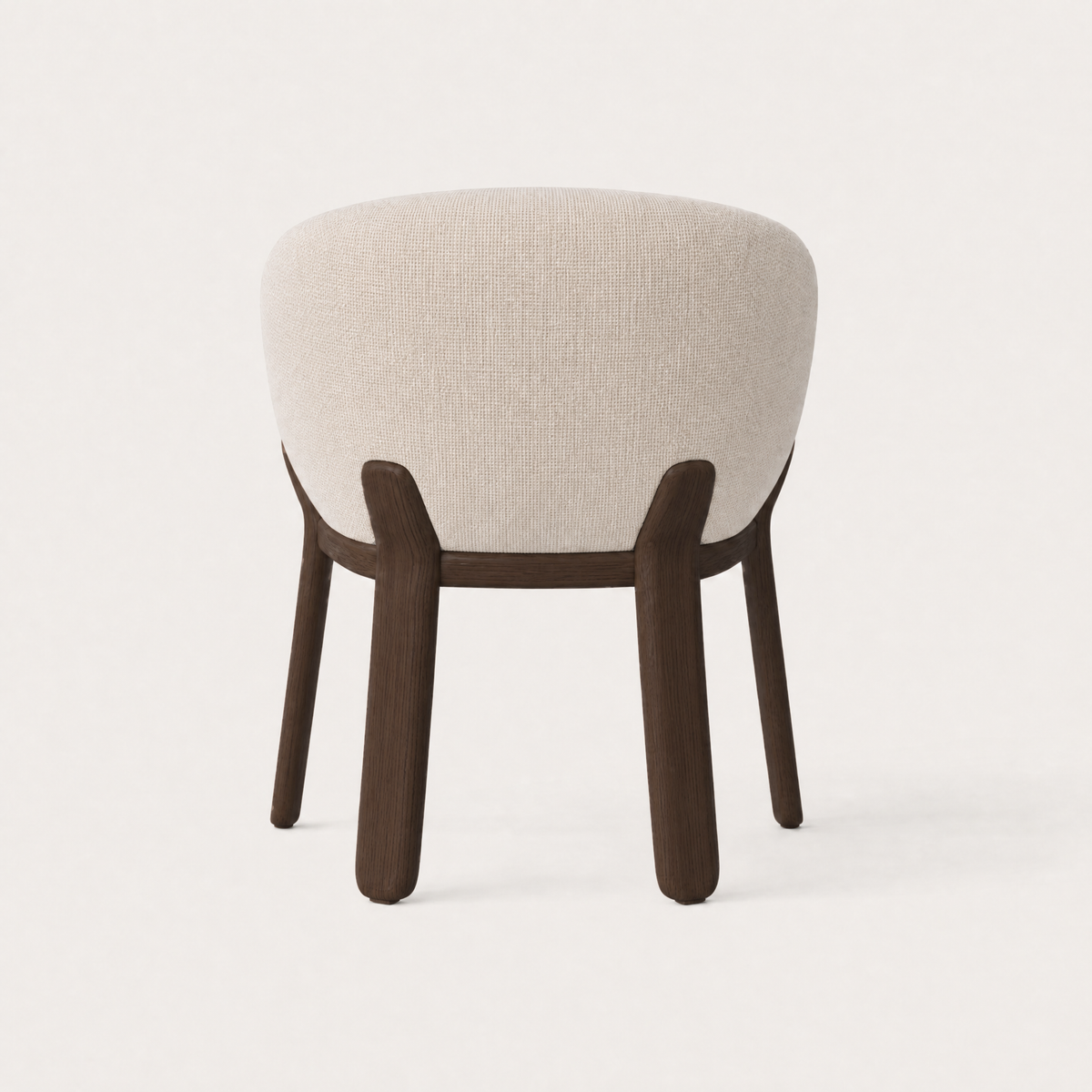 The Lifa Dining Chair at ACERKA Miami highlights Ramón Esteve’s approach to organic form through a curved upholstered seat and architectural solid oak frame.