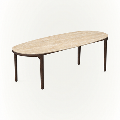 The Tcha Dining Table pairs a softly rounded travertine surface with slender Dark Oak legs, bringing refined architectural proportions to the ACERKA Miami collection.