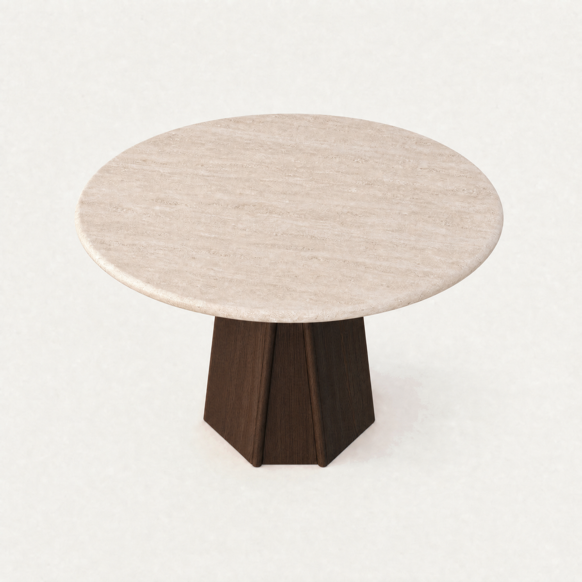 Designed by Valerio Sommella, the Chuli Round Dining Table at ACERKA Miami pairs a circular natural stone top with a sculptural architectural base.