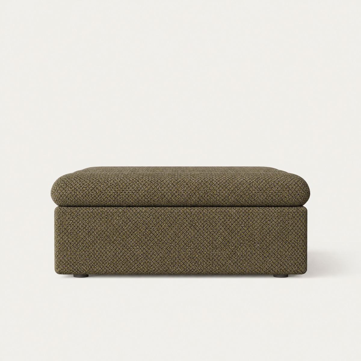 An upholstered ottoman with a textured fabric cover in a dark olive green color, shown from a front-facing perspective against a light off-white background. Designed by Valerio Sommella for Acerka.