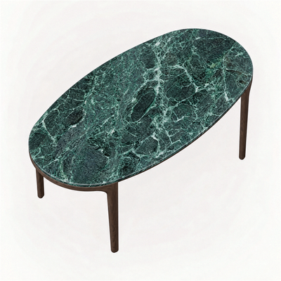 An elongated Verde Alpi marble surface defines the Tcha Dining Table, bringing bold natural character and refined proportions to the ACERKA Miami collection.