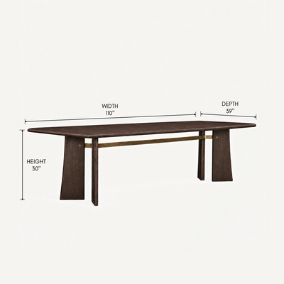 A warm brass accent runs beneath the tabletop of ACERKA Miami’s Balado Rectangular Dining Table, complementing its solid oak construction and sculptural geometry.