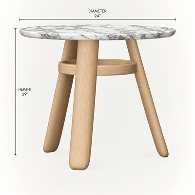 The Lifa Side Table by Ramón Esteve features an Italian Arabescato marble top with distinctive gray veining, a solid oak frame, angled legs, and an integrated lower shelf for ACERKA Miami.
