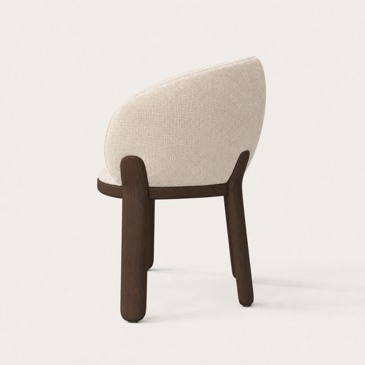 Crafted with a rich Dark Oak frame and gently curved upholstery, the Lifa Dining Chair by Ramón Esteve joins the ACERKA Miami collection with a sculptural silhouette.