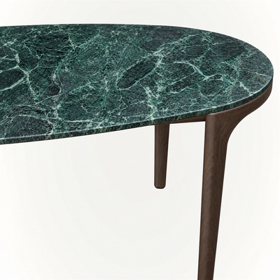 With its expressive marble surface and clean four-leg structure, ACERKA Miami’s Tcha Dining Table balances substantial Verde Alpi stone with visual lightness.