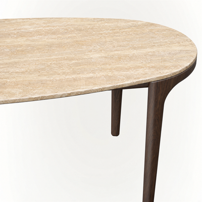 Warm travertine and Dark Oak shape ACERKA Miami’s Tcha Dining Table, combining substantial natural materials with an elegant four-leg silhouette.