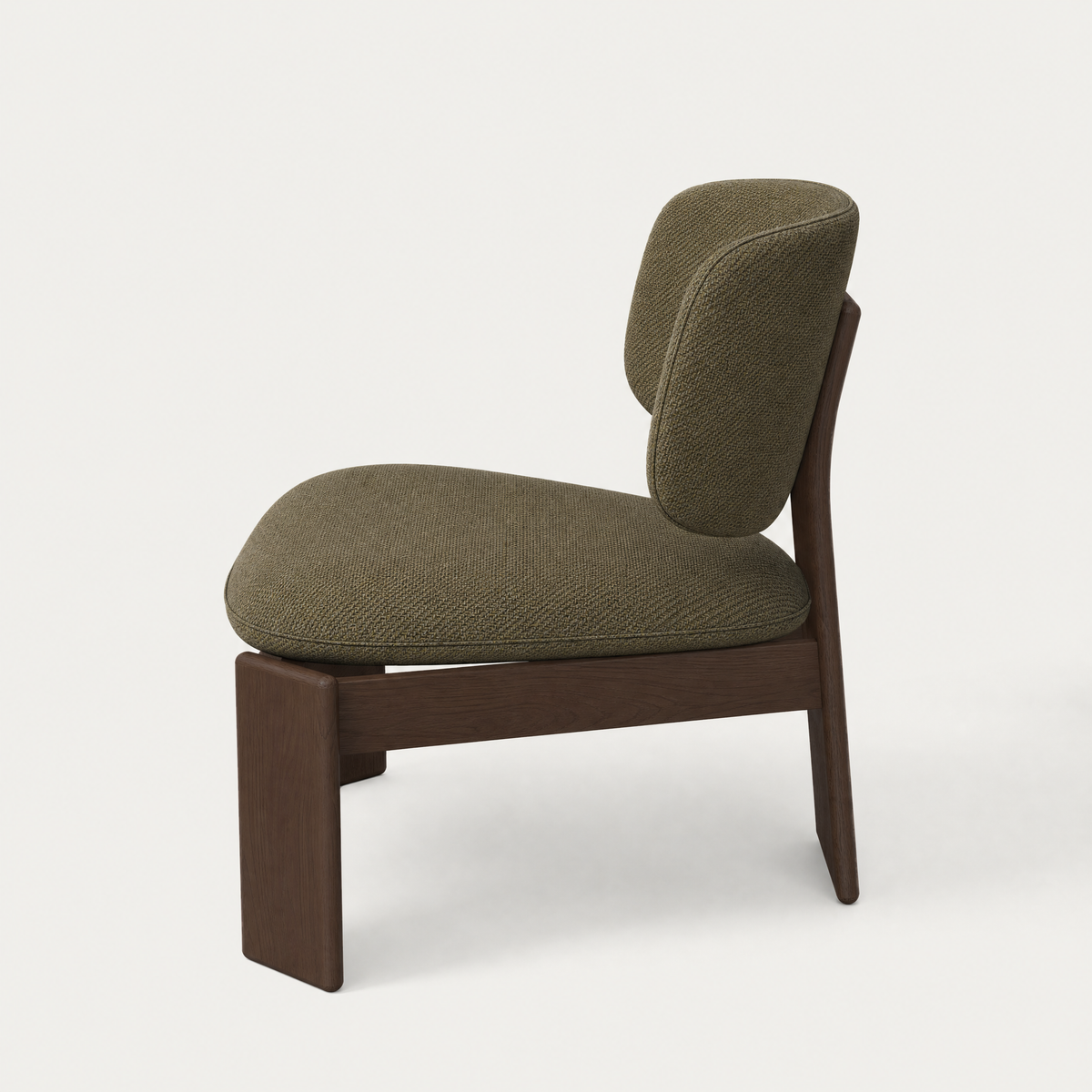 Designed by Valerio Sommella, the Gaba Lounge Chair brings generous proportions and rounded Dark Oak craftsmanship to the collection at ACERKA Miami.